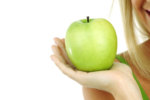 green apple in woman hands