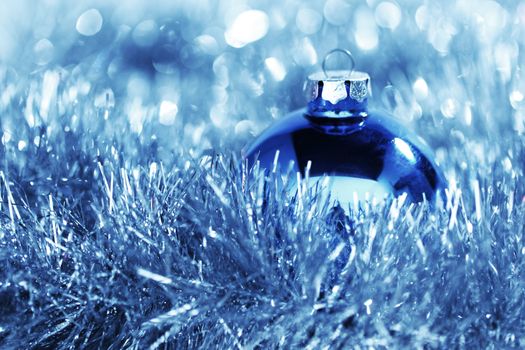 blue christmas ball on holiday background