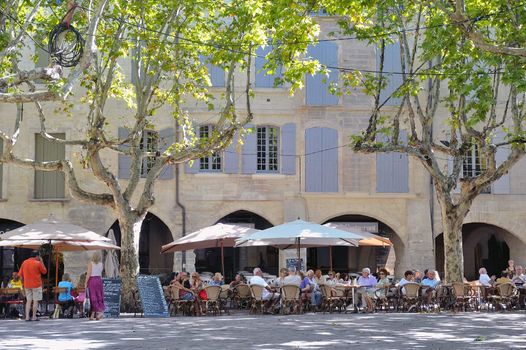 be in hiding of restaurant on a place of Uzes