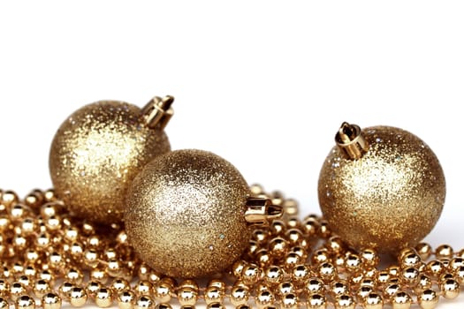  golden christmas ball isolated on white
