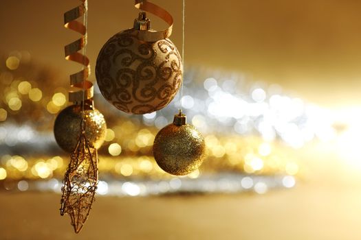 golden christmas balls on bokeh background