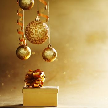 golden christmas balls on bokeh background