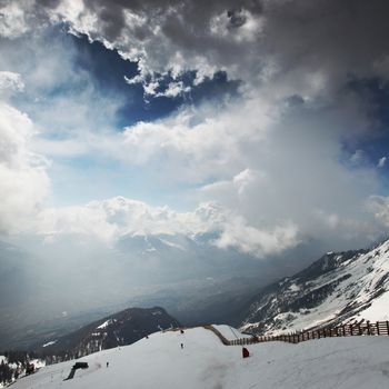 top of mountains sun in blue sky