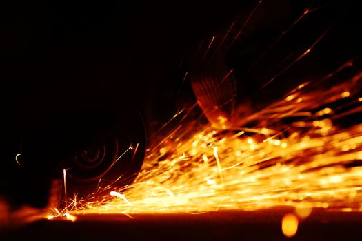 metal sawing close up sparks spray