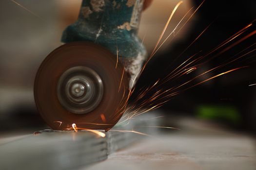 metal sawing close up sparks spray