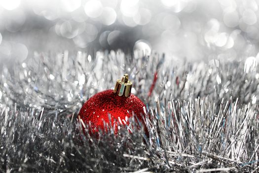 red christmas ball on holiday background