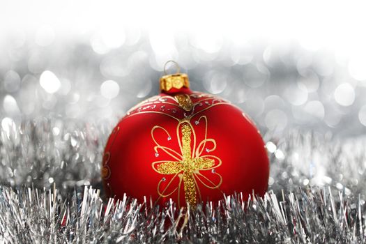 red christmas ball on holiday background