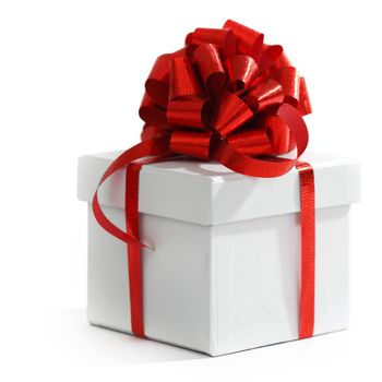 white christmas gift with red ribbon