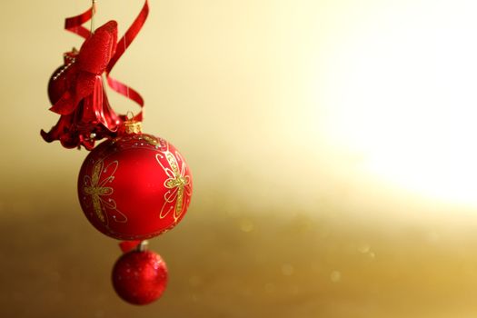  red christmas balls on gold  background