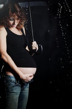 pregnant woman in water studio