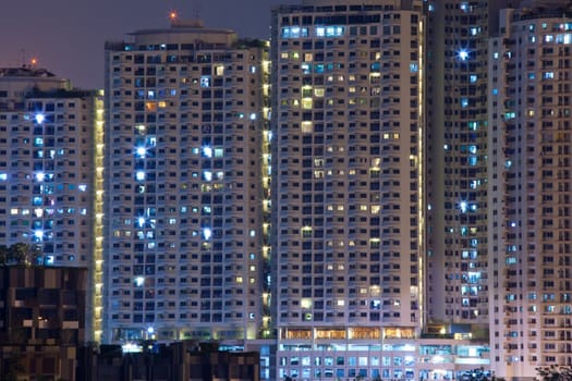 condo building, rent apartments at night in Thailand