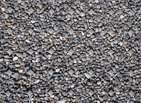 background made of a closeup of a pile of pebbles 