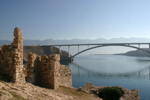 Ancient ruins and bridge over the sea