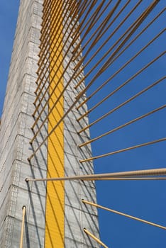 Detail of bridge construction over blue sky , the Rama 8 bridge, Bangkok, Thailand