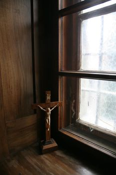 Cross at the window