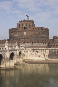 Bridge (Pont Sant' Angelo) over the River Tiber leading to the ancient Castel Sant' Angelo in Rome, Italy.