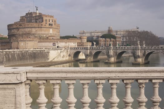 Bridge (Pont Sant' Angelo) over the River Tiber leading to the ancient Castel Sant' Angelo in Rome, Italy.