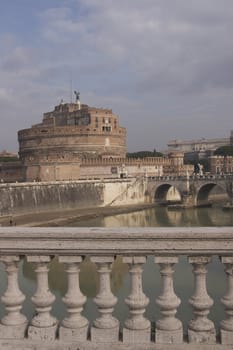 Bridge (Pont Sant' Angelo) over the River Tiber leading to the ancient Castel Sant' Angelo in Rome, Italy.