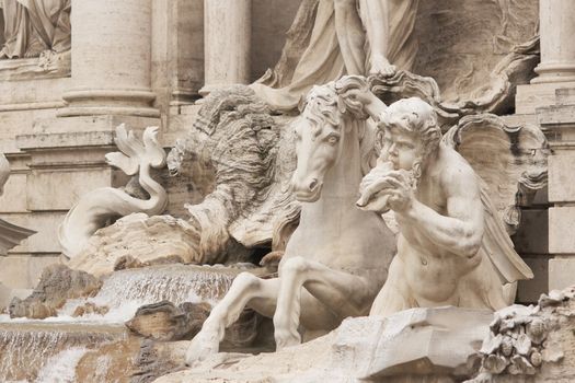 Detail of statues adorning the Trevi Fountain in Rome, Italy