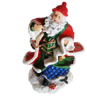 Santa Claus. A photo of a ceramic toy Santa, a writing congratulation