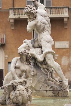 Statue of Neptune in the Fontana di Nettuno in Piazza Navona, Rome, Italy