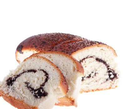 Sliced ​​bread with poppy seeds on a white background