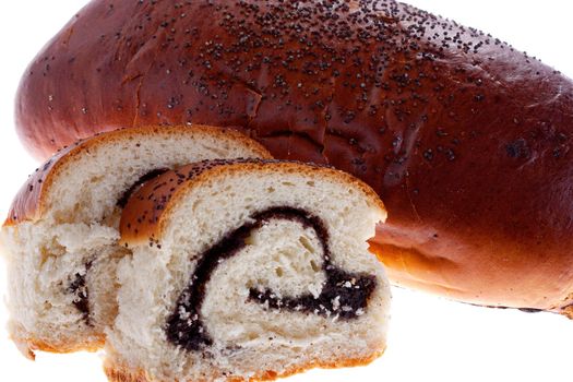 Sliced ​​bread with poppy seeds on a white background