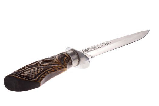 isolated dagger with a wooden handle and engraved blade