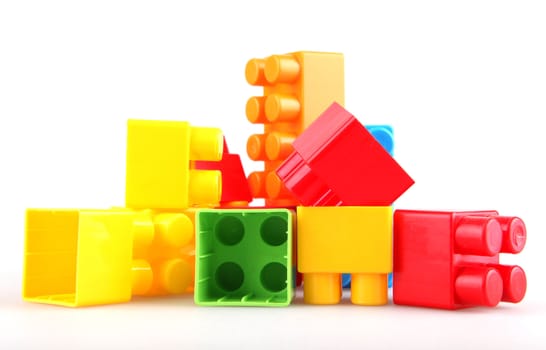 Plastic toy blocks on white background