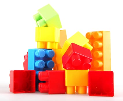 Plastic toy blocks on white background