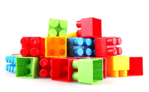Plastic toy blocks on white background
