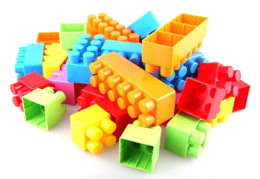 Plastic toy blocks on white background