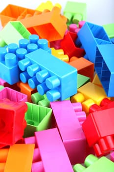 Plastic toy blocks on white background