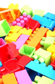 Plastic toy blocks on white background