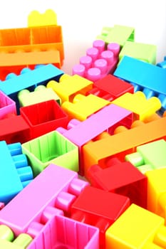 Plastic toy blocks on white background