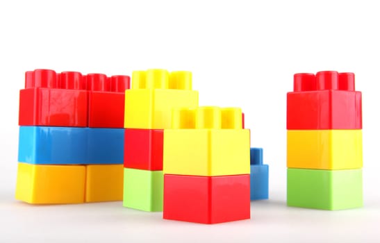 Plastic toy blocks on white background