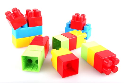 Plastic toy blocks on white background