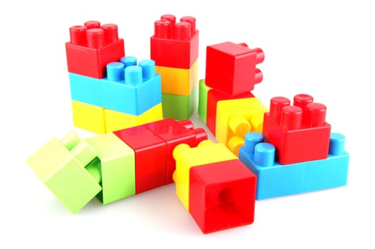 Plastic toy blocks on white background