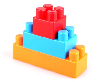 Plastic toy blocks on white background