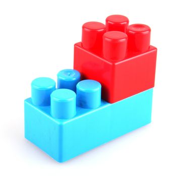 Plastic toy blocks on white background