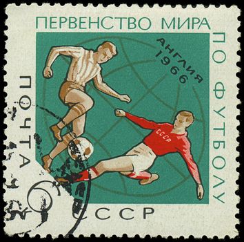 USSR - CIRCA 1966: A stamp printed in Ussr showing football players, circa 1966