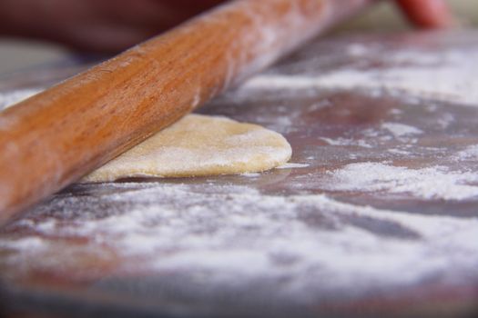 hand made ravioli getting prepared on table 