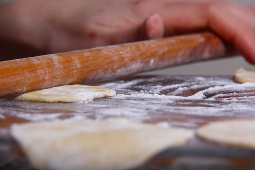 hand made ravioli getting prepared on table 