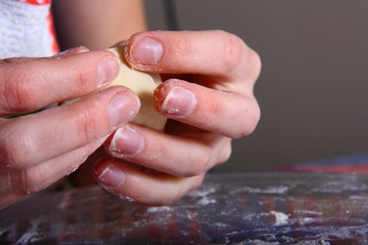 hand made ravioli getting prepared on table 