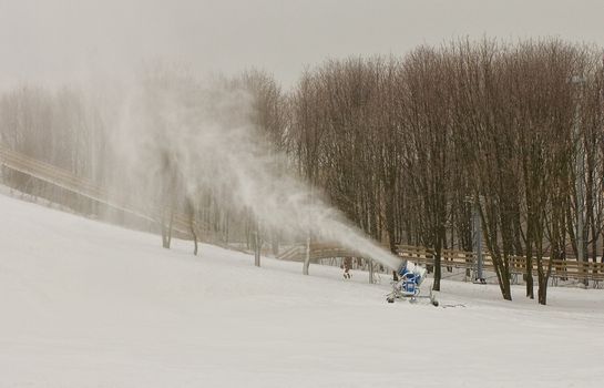 snow cannon making artificial snow