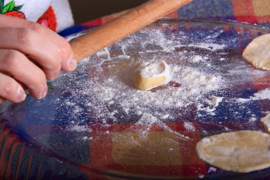 hand made ravioli getting prepared on table 