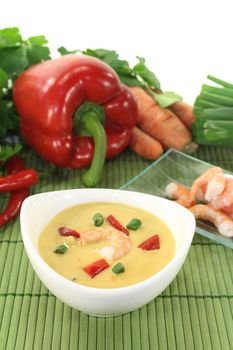 fresh Curry Soup with shrimp, bell pepper, leeks and coconut milk