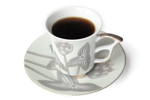 coffee cup and saucer with pattern