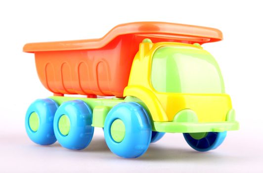 Colorful toy truck isolated on white background