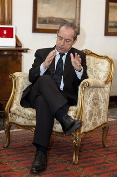 OPM, AUBERGE DE CASTILLE, VALLETTA, MALTA - MAY 12 - The Prime Minister of Malta, Dr. Lawrence Gonzi, with reporters from The Report Company in partnership with of Guardian News and Media UK on 12 May 2011.